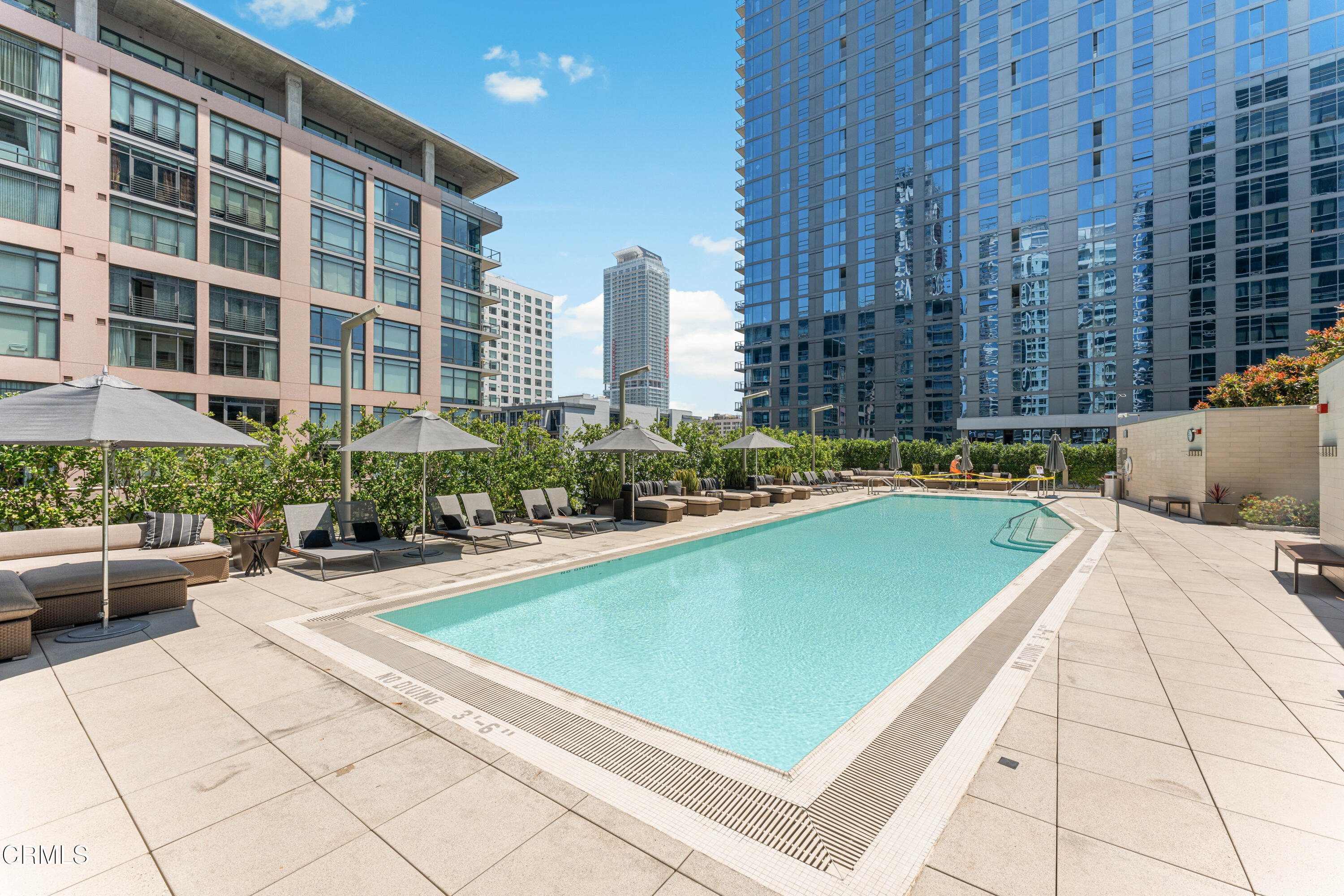 1155 South Grand Avenue, Unit 2106 Los Angeles, CA 90015 - Photo 40 of 51 a view of swimming pool with outdoor seating