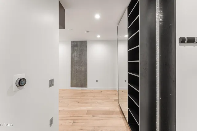 an entryway with wooden floor