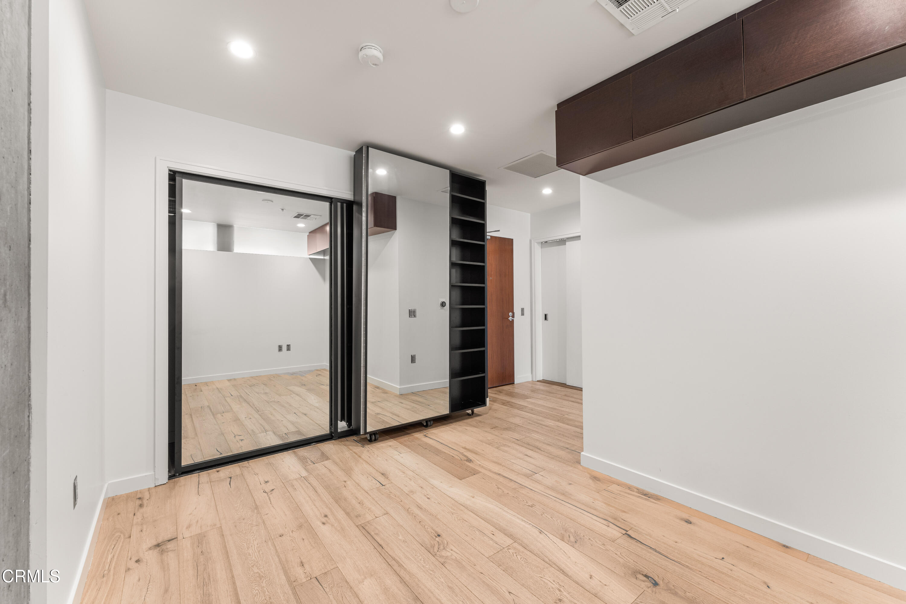 1155 South Grand Avenue, Unit 2106 Los Angeles, CA 90015 - Photo 7 of 51 a view of hallway with wooden floor