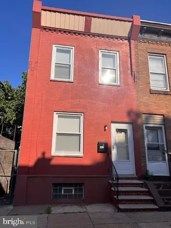a front view of a building with balcony