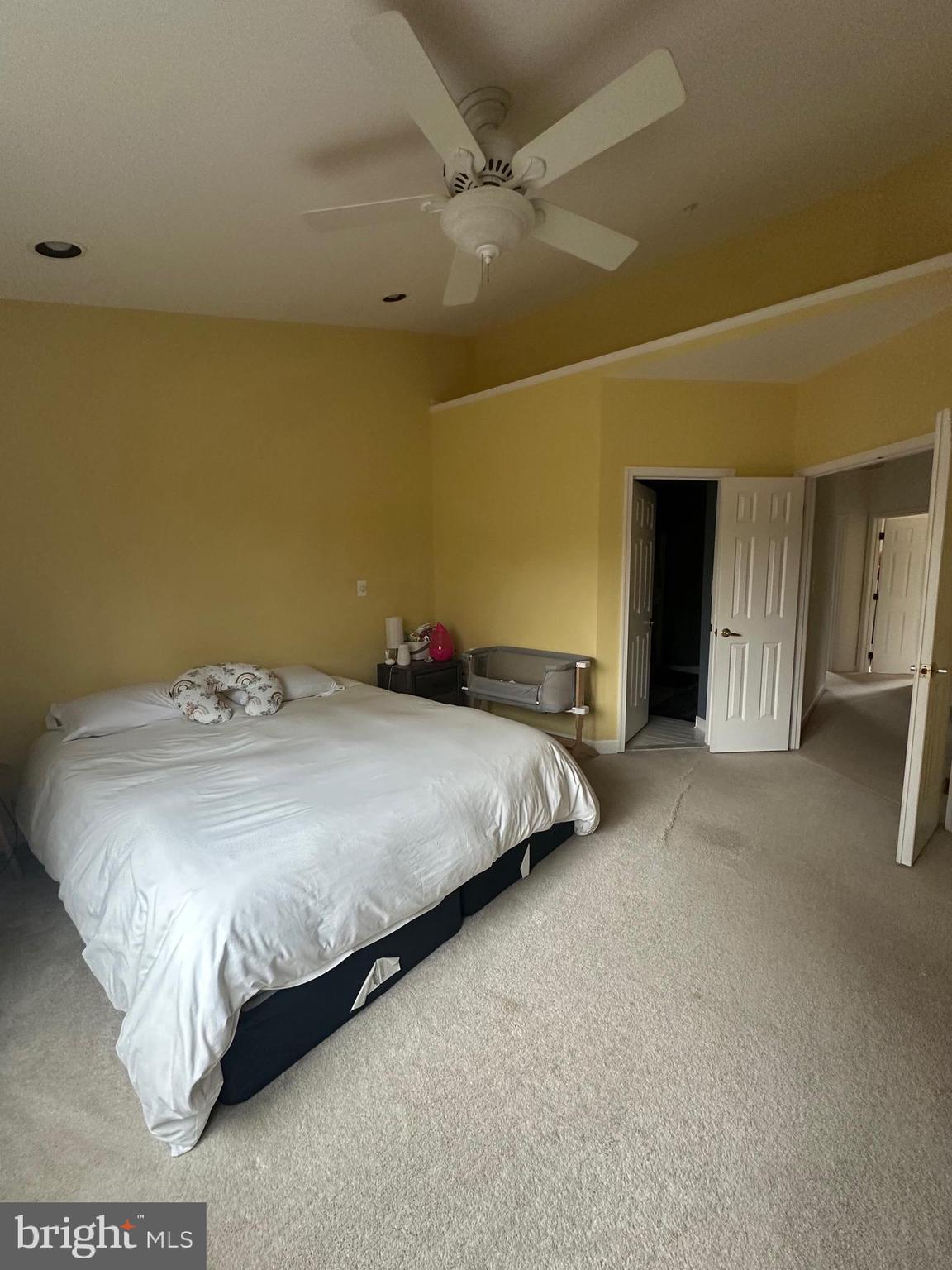 29 Stridesham Court Baltimore, MD 21209 - Photo 14 of 23 a bedroom with a bed and a ceiling fan