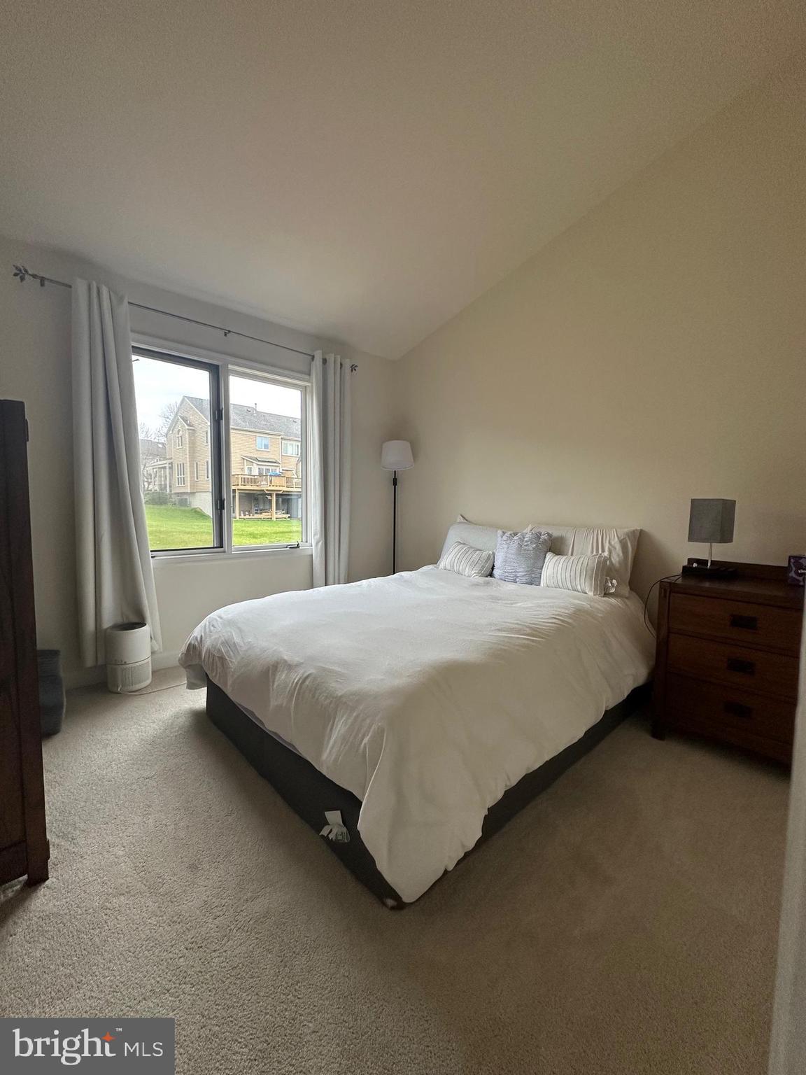 29 Stridesham Court Baltimore, MD 21209 - Photo 16 of 23 a large bed sitting in a bedroom next to a window