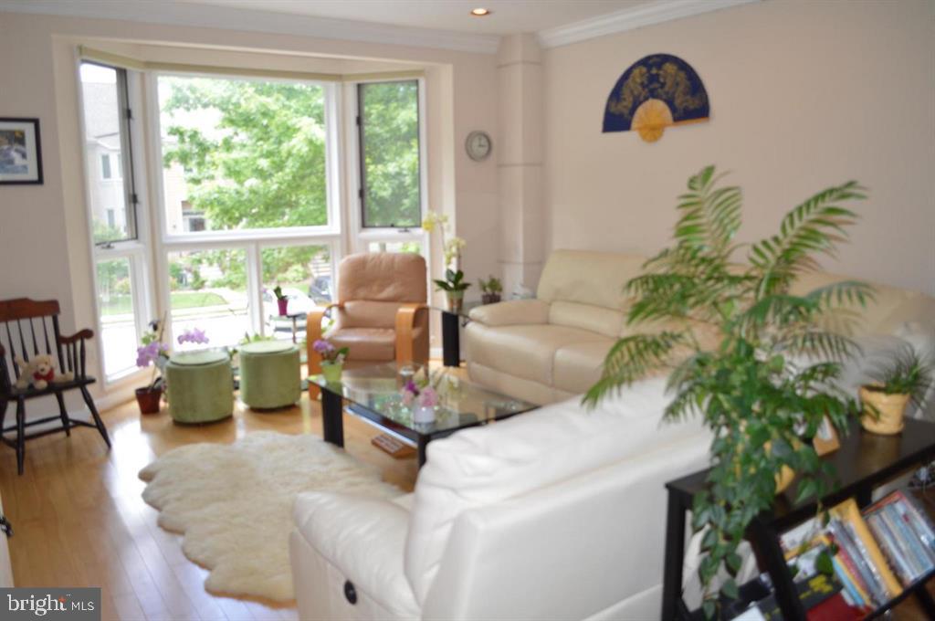 29 Stridesham Court Baltimore, MD 21209 - Photo 3 of 23 a living room with furniture and a large window