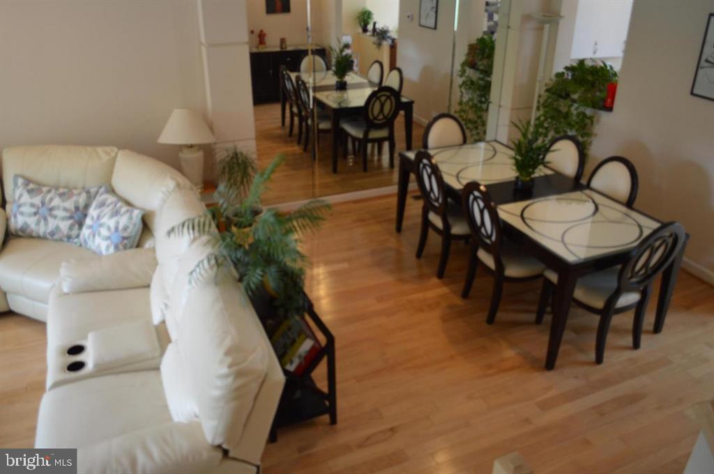 29 Stridesham Court Baltimore, MD 21209 - Photo 9 of 23 a view of a dining room with furniture and wooden floor