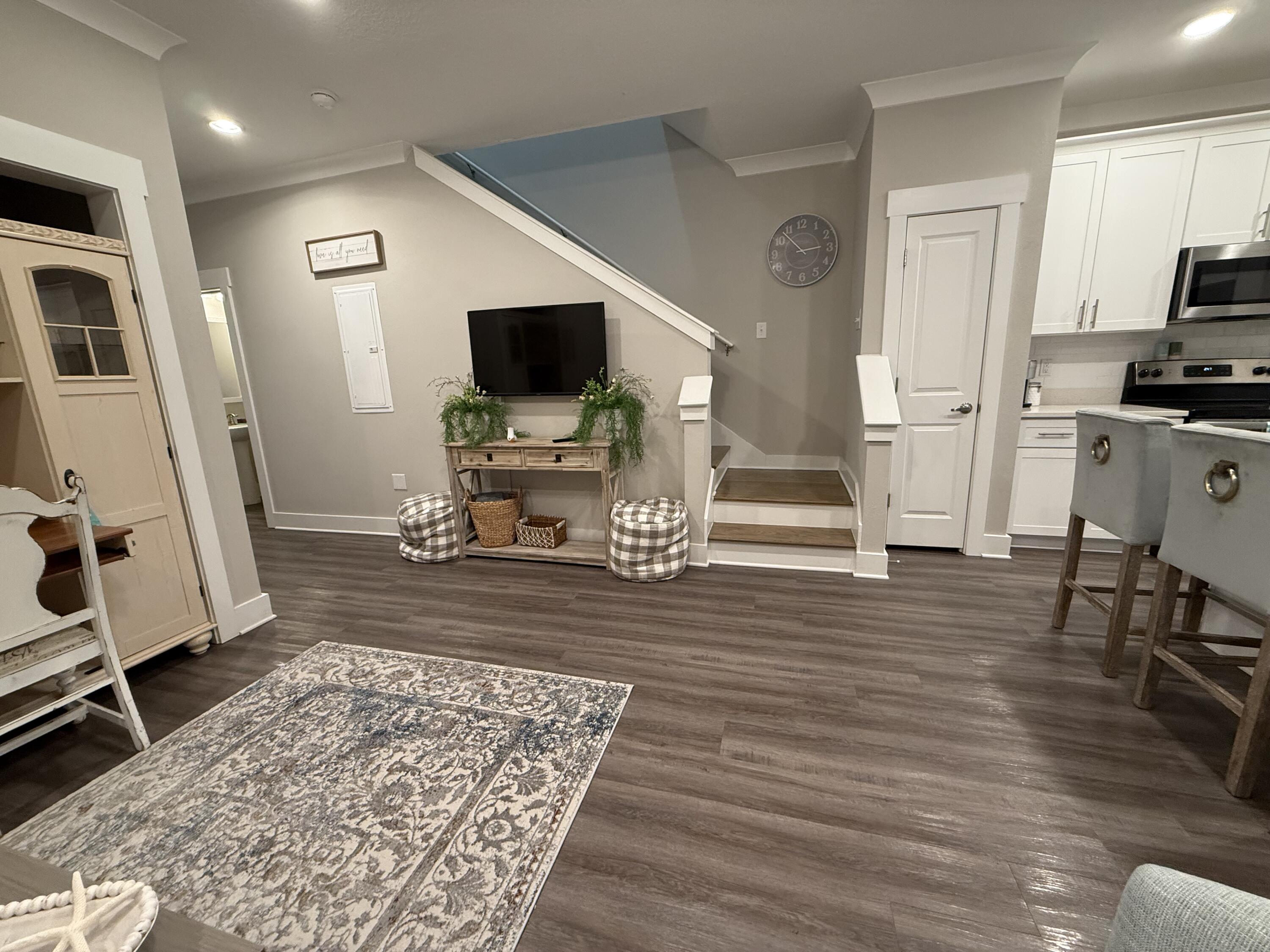 406 Date Palm Lane Freeport, FL 32439 - Photo 12 of 44 a living room with furniture and a flat screen tv