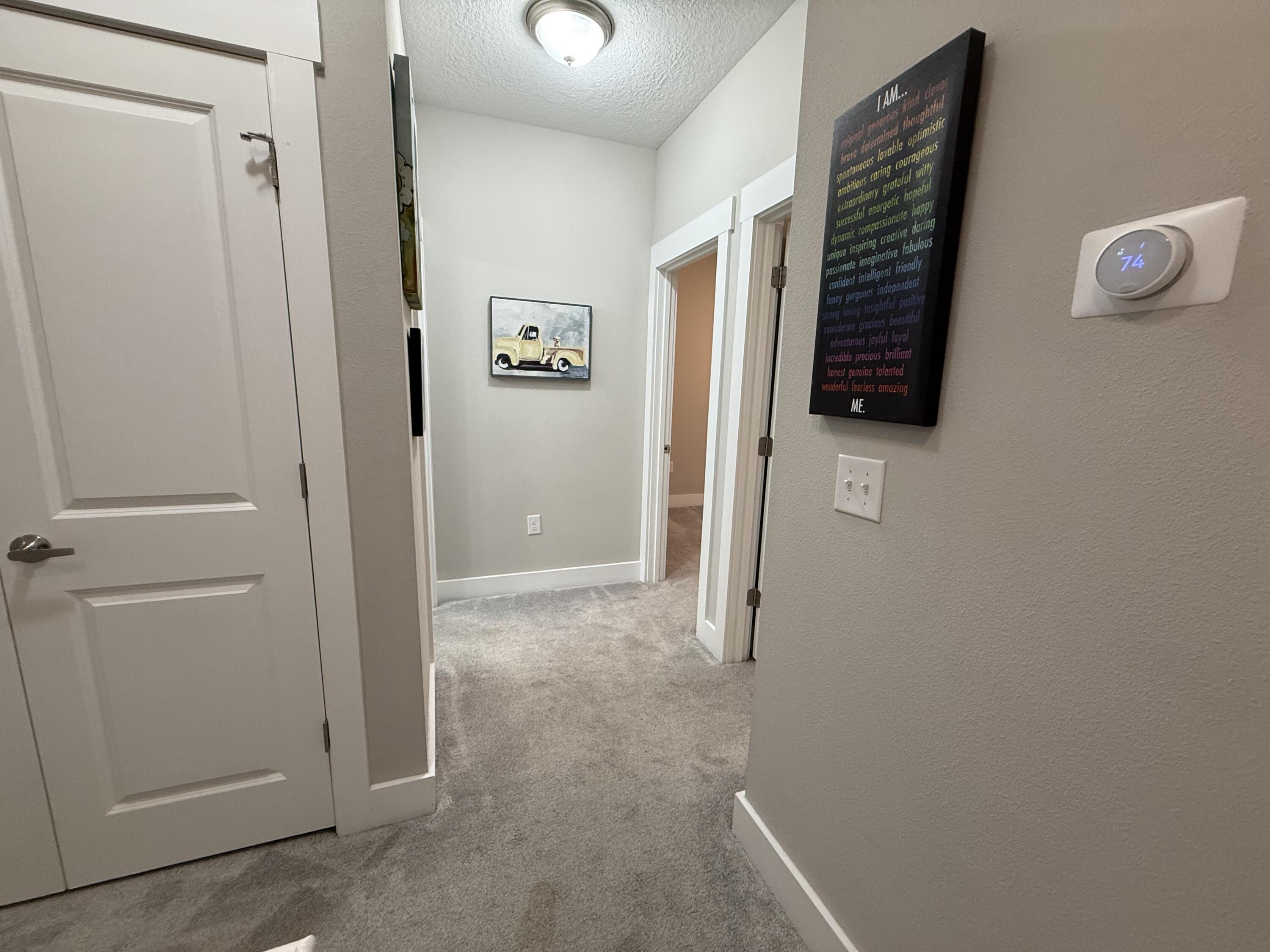 406 Date Palm Lane Freeport, FL 32439 - Photo 26 of 44 a view of room with walk in closet and window