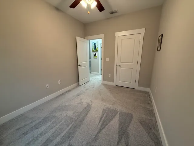 a view of hallway with stairs