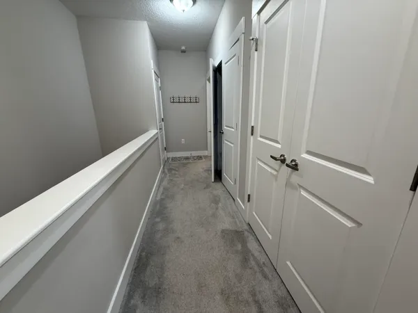 a view of a room with racks on the wall