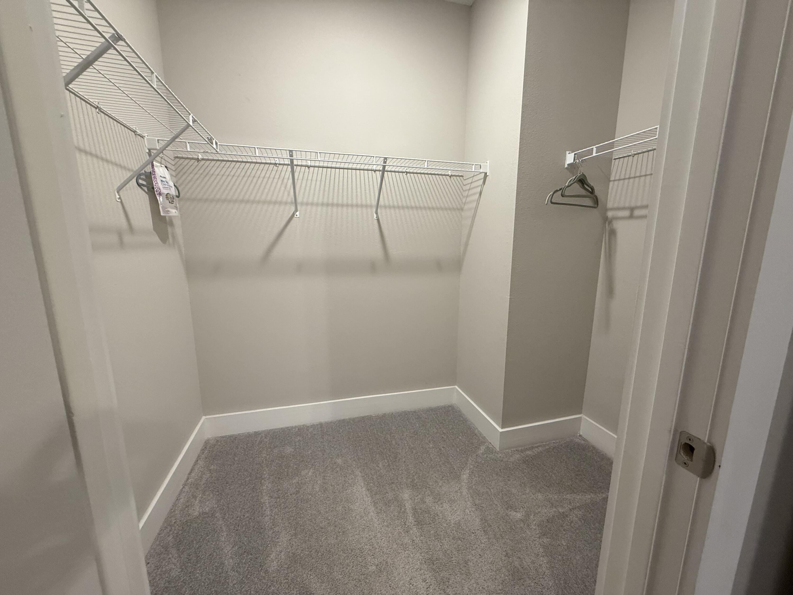 406 Date Palm Lane Freeport, FL 32439 - Photo 36 of 44 a view of a room with racks on the wall