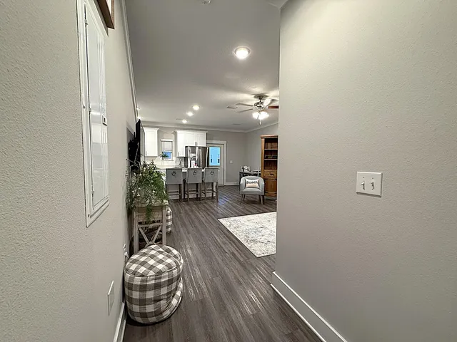 a view of a workspace with furniture and a livingroom