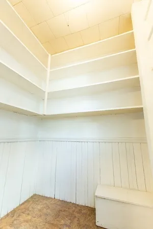 a bathroom with a shower and toilet