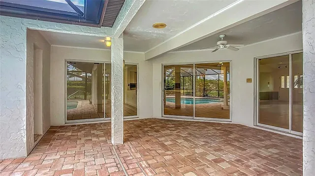 a view of swimming pool with a sitting area