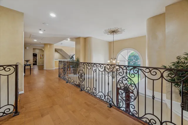 a front view of a house with swimming pool garden and patio