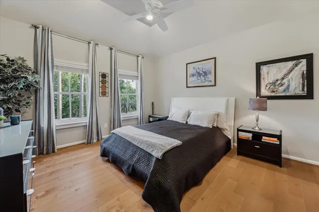 a aerial view of a house with a yard basket ball court and outdoor seating