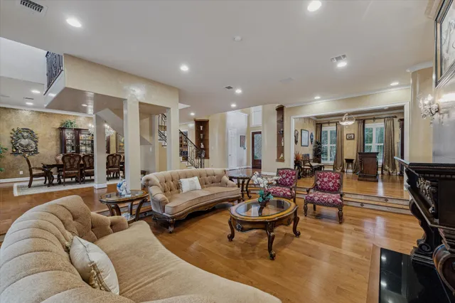 a view of a dining room with furniture water and chandelier