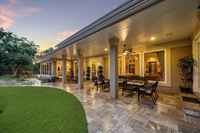 a kitchen with stainless steel appliances granite countertop a stove refrigerator and cabinets