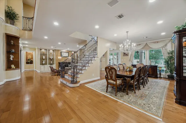 a large kitchen with lots of counter top space and stainless steel appliances