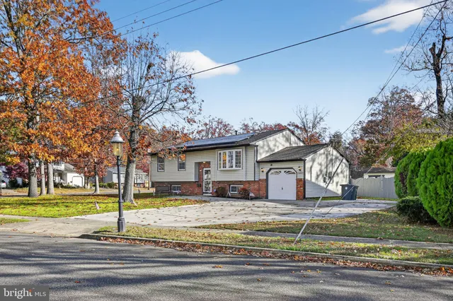 a kitchen with a sink a stove and refrigerator