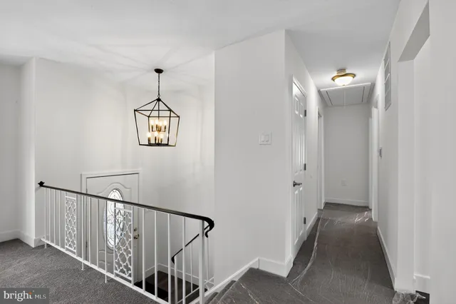 a view of an empty room and a window