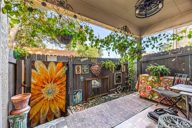 an aerial view of a house with a ocean view