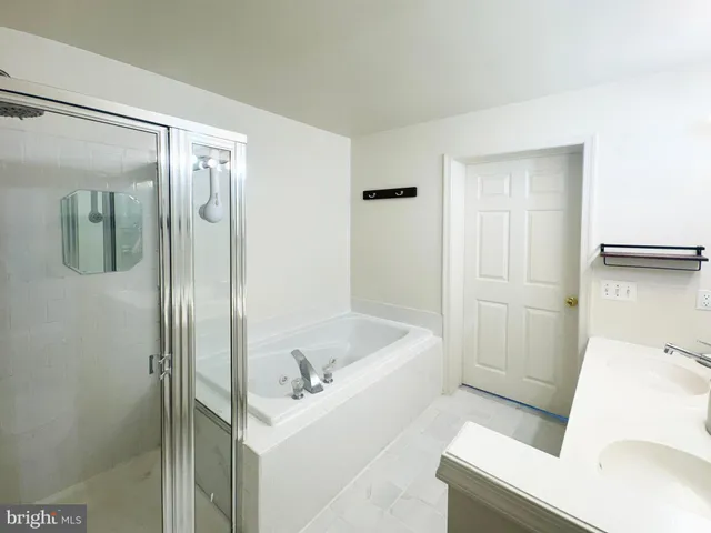 a bathroom with a sink and a tub