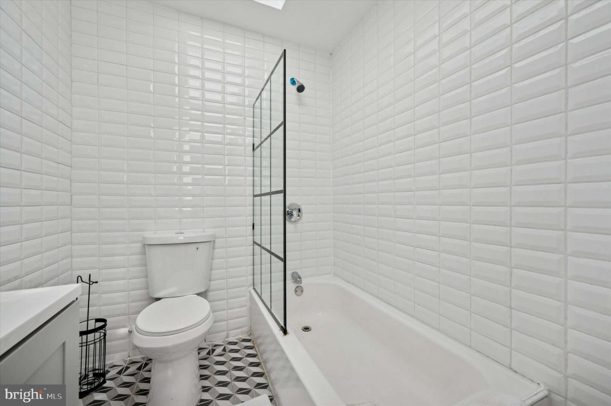 650 East Wensley Street Philadelphia, PA 19134 - Photo 16 of 24 a bathroom with a toilet and a shower