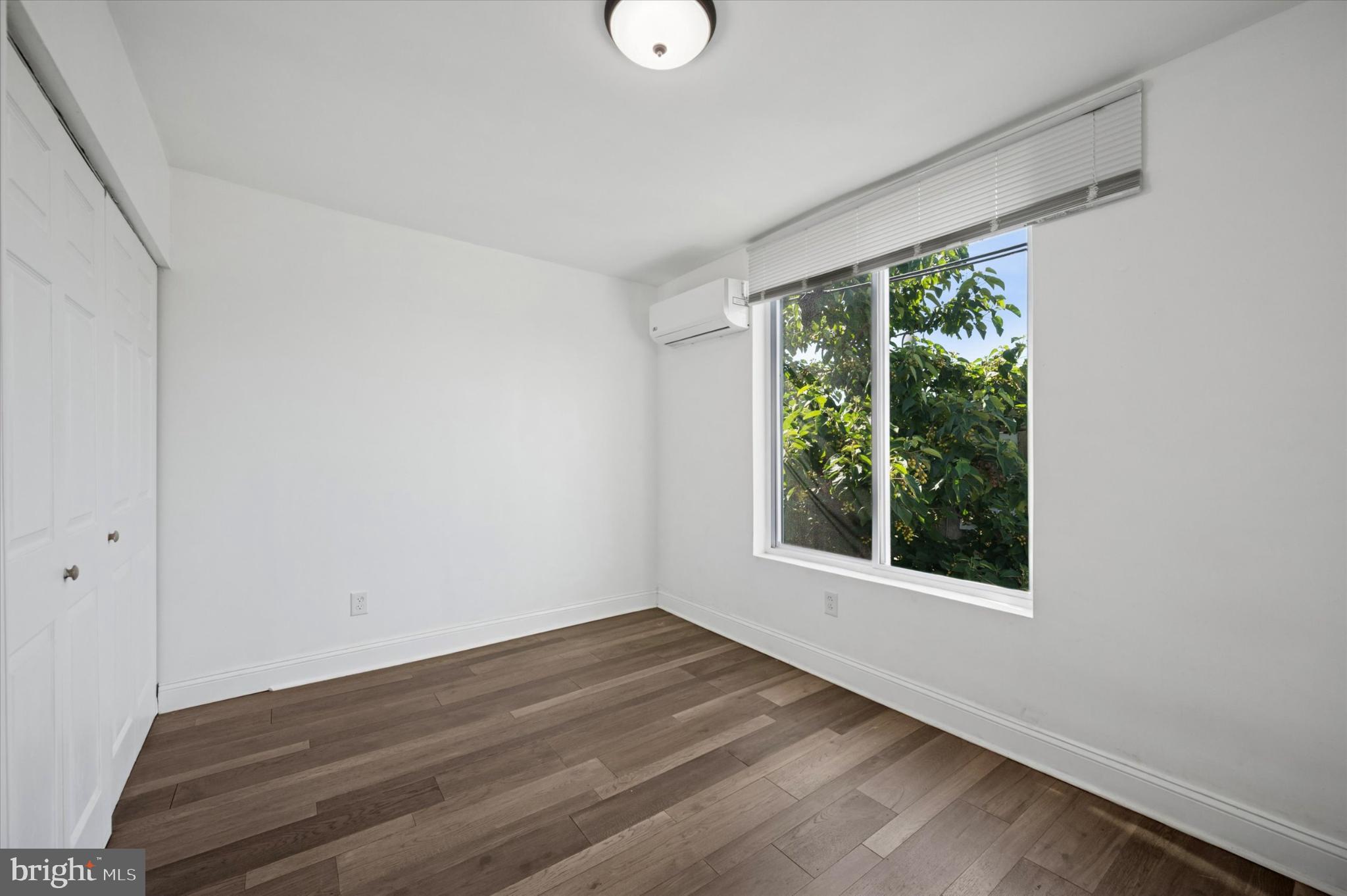 650 East Wensley Street Philadelphia, PA 19134 - Photo 18 of 24 a view of a room with wooden floor and windows