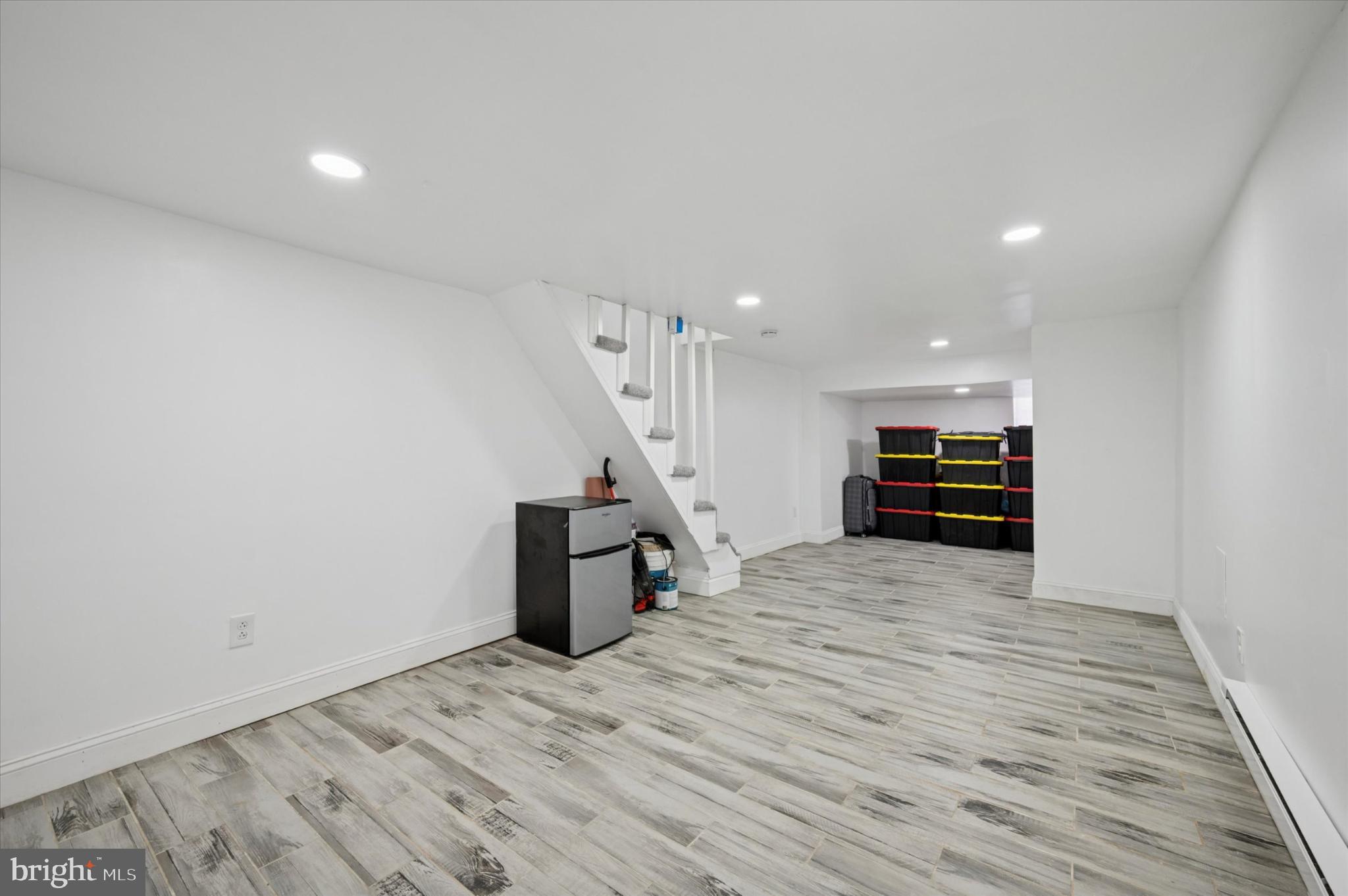 650 East Wensley Street Philadelphia, PA 19134 - Photo 22 of 24 a view of empty room with stairs and cabinet