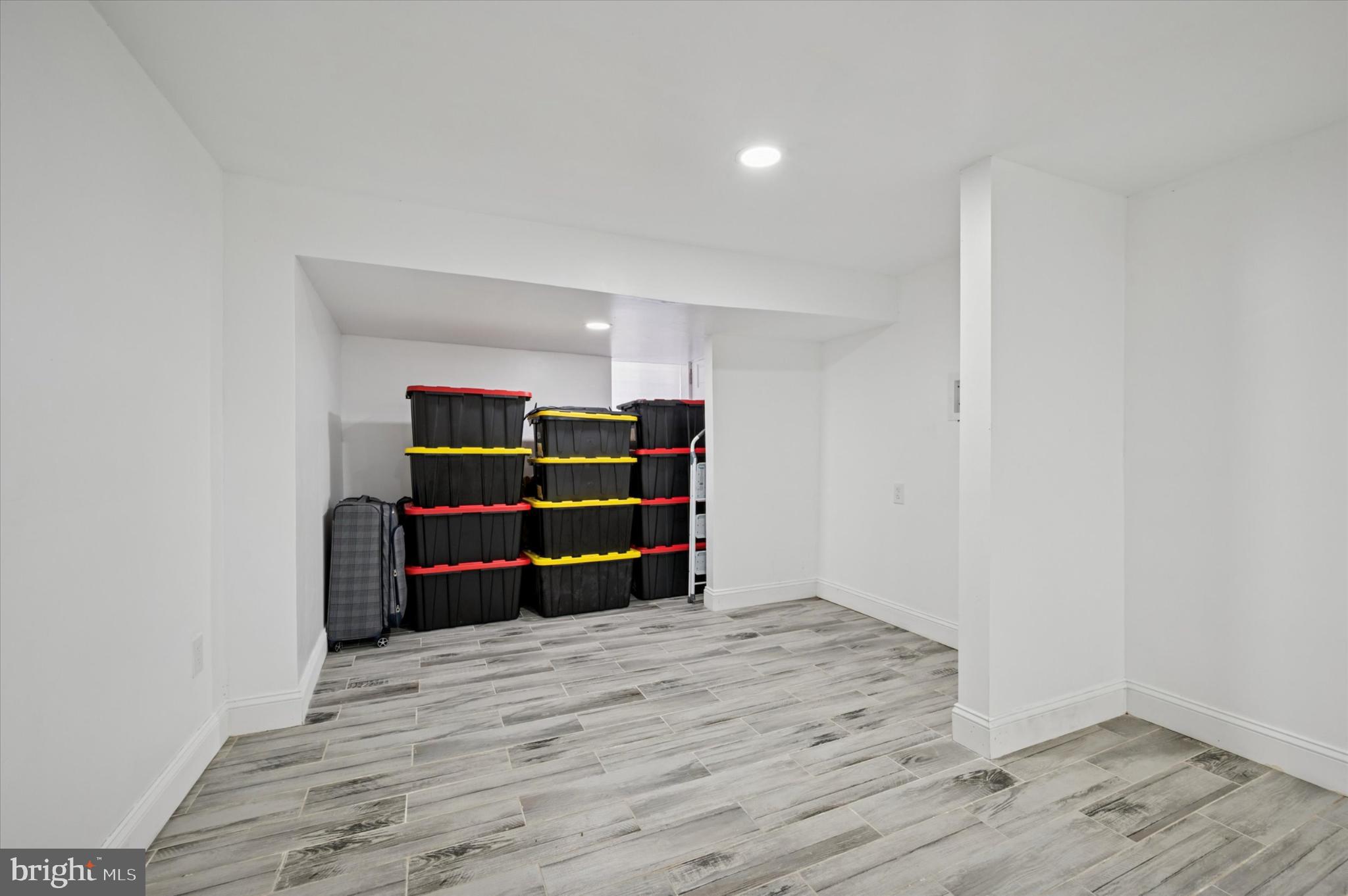 650 East Wensley Street Philadelphia, PA 19134 - Photo 23 of 24 a room with a wooden floor and shelf