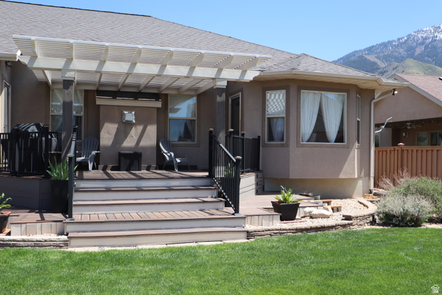 1055 North 1000 East Mapleton, UT 84664 - Photo 90 of 112 Expansive deck with multi-level wood-finish stairs and black railings