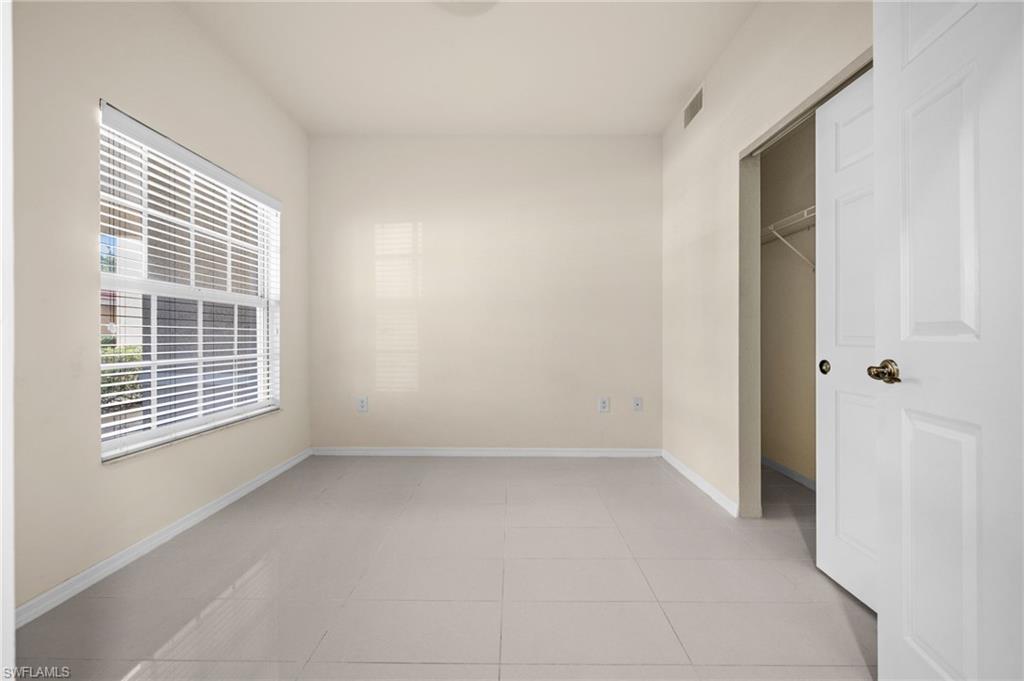4520 Botanical Pl Circle, Unit 103 Naples, FL 34112 - Photo 14 of 19 Sunny 3rd bedroom