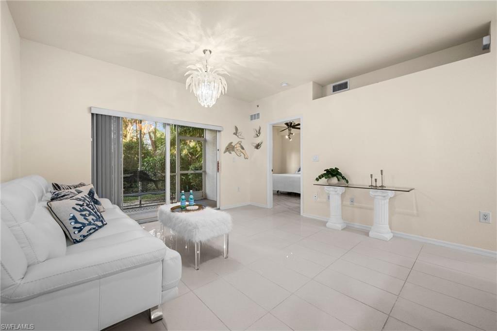 4520 Botanical Pl Circle, Unit 103 Naples, FL 34112 - Photo 4 of 19 Private preserve views & Plant shelves