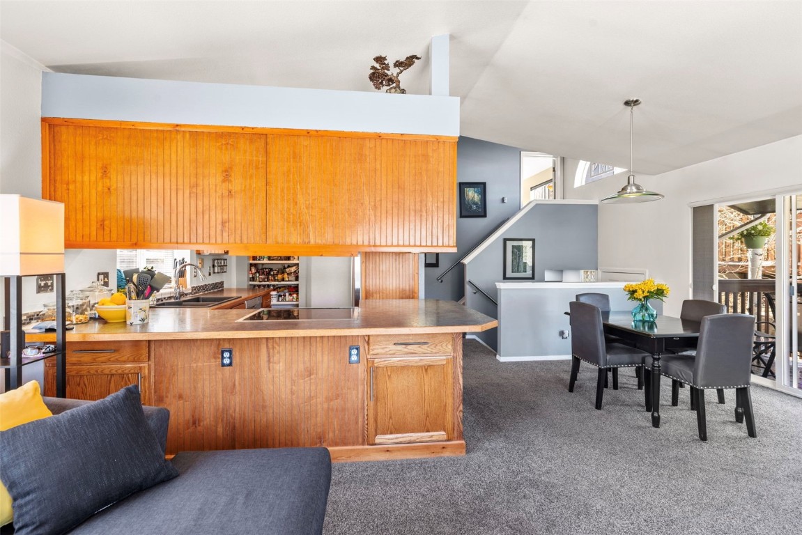 654 Alpine Road Dillon, CO 80435 - Photo 20 of 40 a open kitchen with a table and chairs