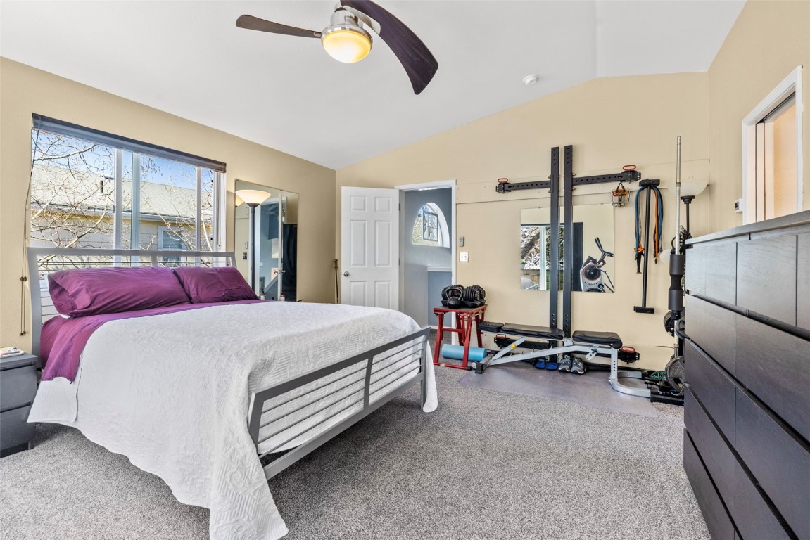 654 Alpine Road Dillon, CO 80435 - Photo 27 of 40 a bedroom with a bed and a large window
