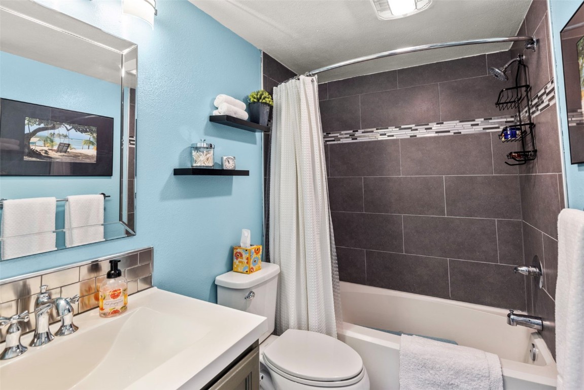 654 Alpine Road Dillon, CO 80435 - Photo 32 of 40 a bathroom with a sink toilet and shower