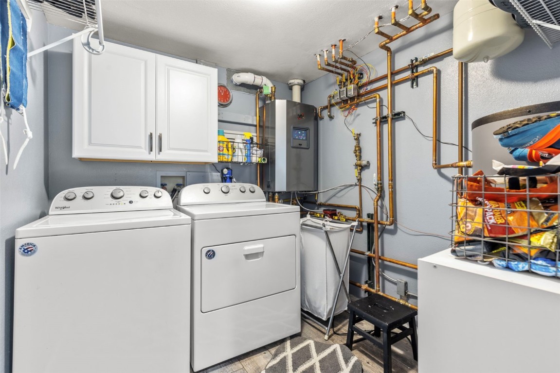 654 Alpine Road Dillon, CO 80435 - Photo 35 of 40 a utility room with dryer and washer