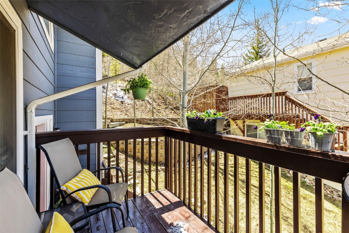 654 Alpine Road Dillon, CO 80435 - Photo 36 of 40 a view of a chairs and table in the balcony