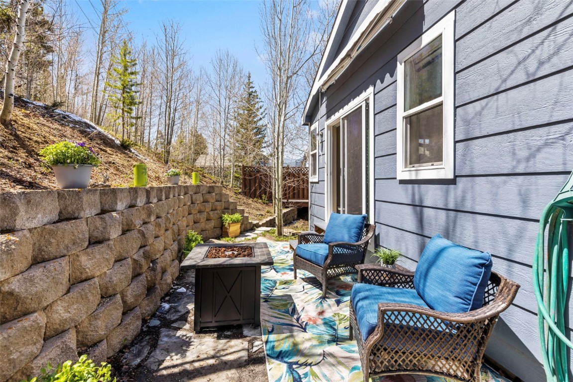 654 Alpine Road Dillon, CO 80435 - Photo 39 of 40 a backyard of a house with outdoor seating