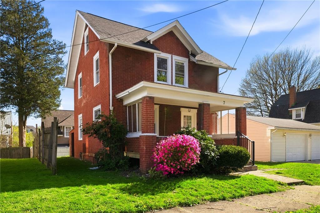 7 West Edison Avenue New Castle, PA 16101 - Photo 1 of 30 a front view of a house with garden