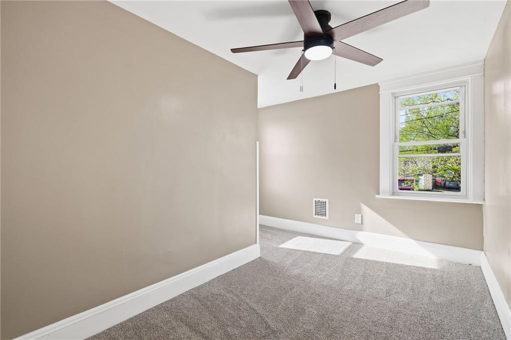 7 West Edison Avenue New Castle, PA 16101 - Photo 13 of 30 a view of an empty room with a window