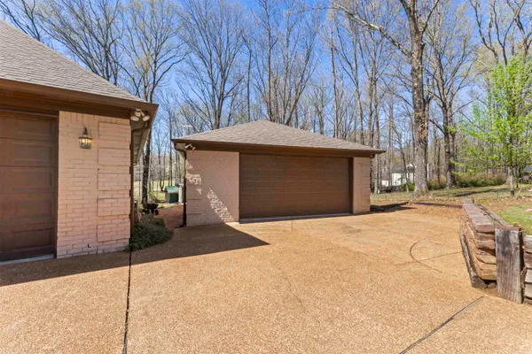 a front view of a house with a garage