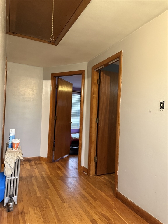 102 Weare Street Lawrence, MA 01843 - Photo 18 of 27 a view of empty room with wooden floor