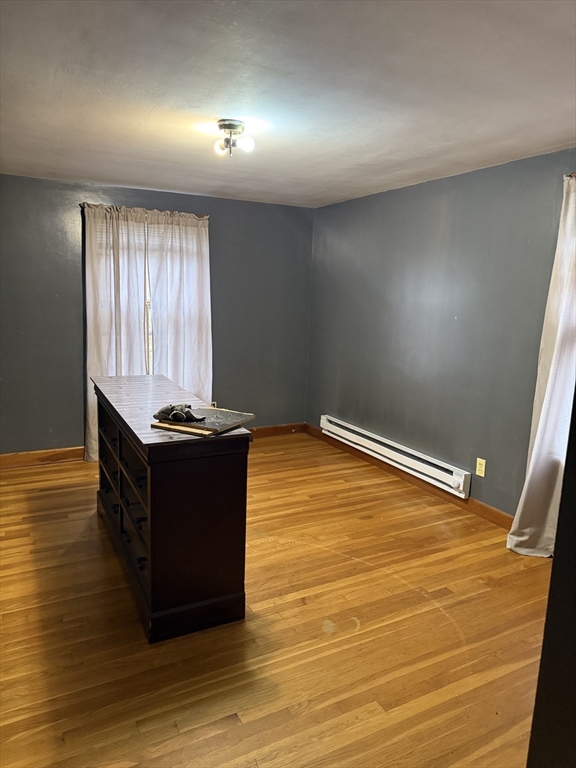 102 Weare Street Lawrence, MA 01843 - Photo 19 of 27 a room with a wooden floor