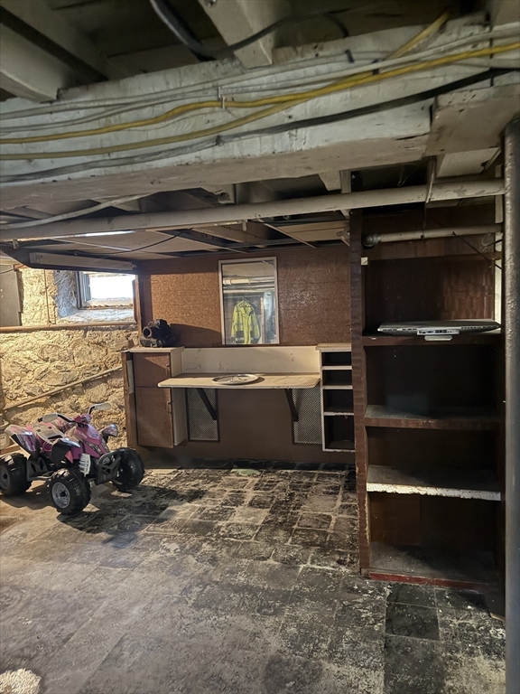 102 Weare Street Lawrence, MA 01843 - Photo 26 of 27 a room with storage and utility