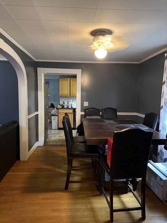 102 Weare Street Lawrence, MA 01843 - Photo 8 of 27 a view of a dining room with furniture and a chandelier