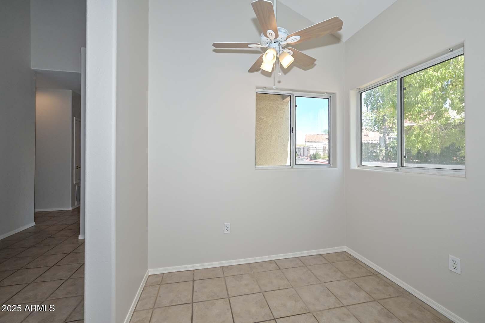 7101 West Beardsley Road, Unit 1104 Glendale, AZ 85308 - Photo 11 of 40 a view of an empty room with a window