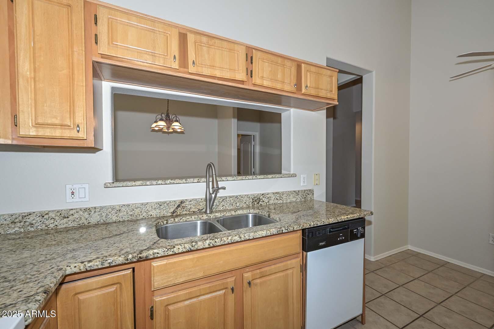 7101 West Beardsley Road, Unit 1104 Glendale, AZ 85308 - Photo 12 of 40 a bathroom with a sink and a mirror