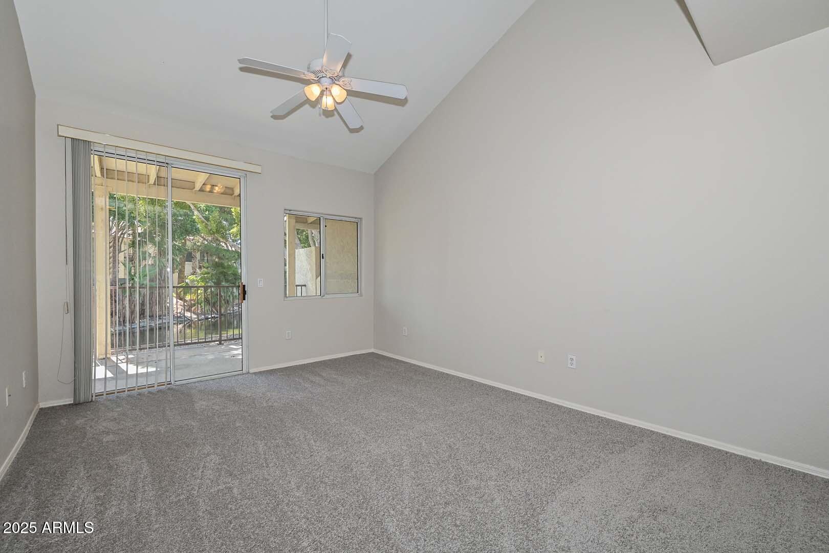 7101 West Beardsley Road, Unit 1104 Glendale, AZ 85308 - Photo 14 of 40 a view of an empty room with a window