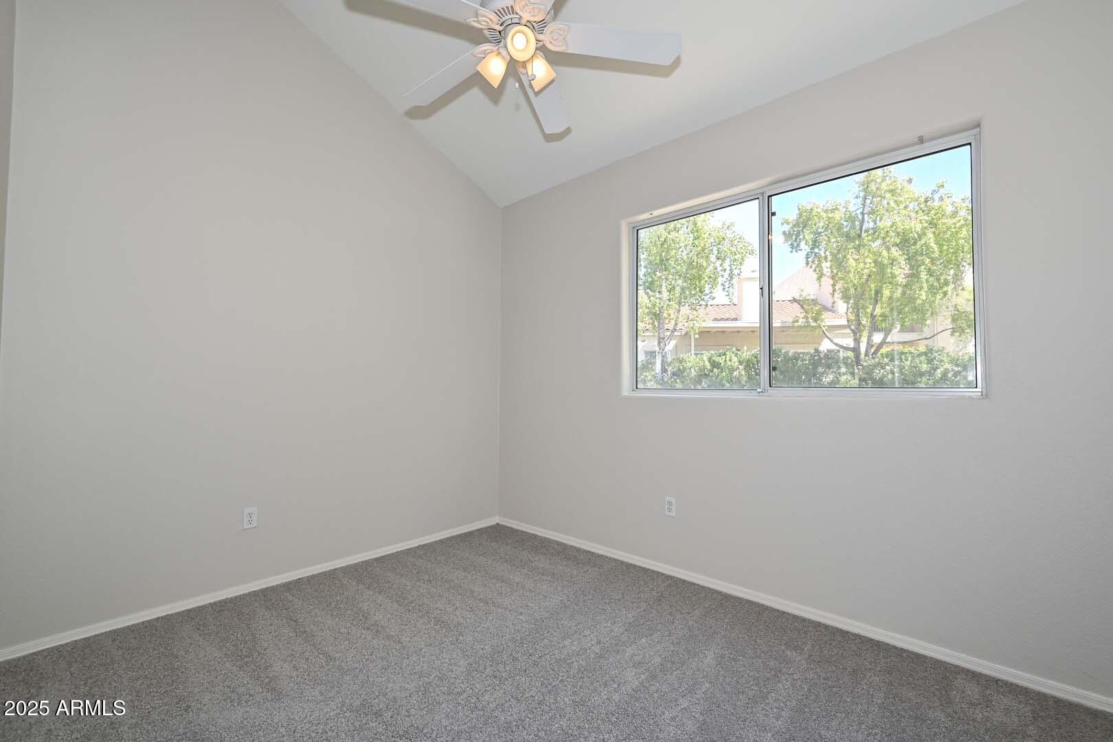 7101 West Beardsley Road, Unit 1104 Glendale, AZ 85308 - Photo 19 of 40 an empty room with a window