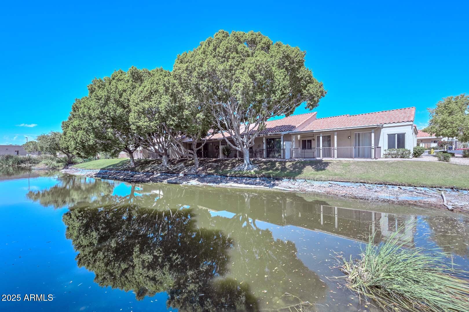 7101 West Beardsley Road, Unit 1104 Glendale, AZ 85308 - Photo 30 of 40 a view of a house with a yard